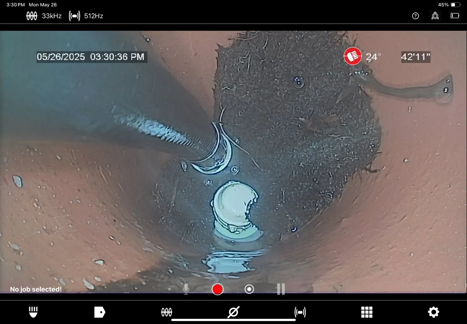 Sewer camera capture dated May 26, 2025 showing a lateral joint at 42 feet 11 inches